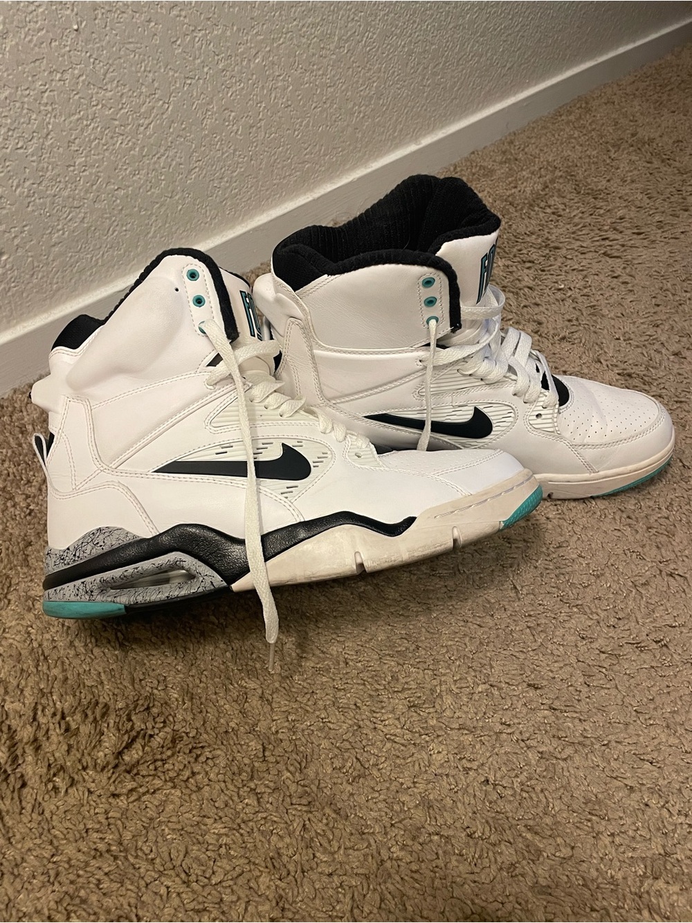 Nike White High-Top Sneakers with Black and Teal Accents